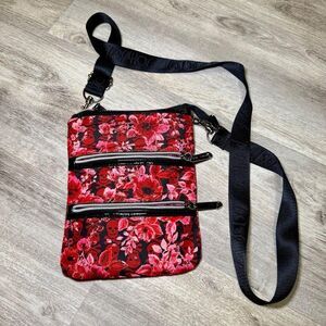 Betsey Johnson Crossbody Handbag Pink Flowers and Skulls Zippers on the Outside.